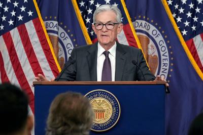 Fed Chair Powell says officials are in no hurry to cut interest rates