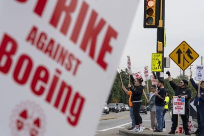 Boeing freezes hiring and executives’ first-class travel as massive strike continues