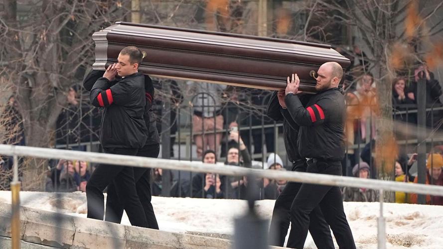 Thousands gather for Navalny’s funeral in Moscow despite threat of arrest