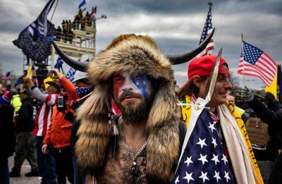'QAnon Shaman' Jacob Chansley sentenced to 41 months in prison for role in US Capitol riot