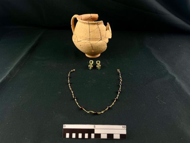 Ancient skeletons buried in shoes and jewels discovered during building work