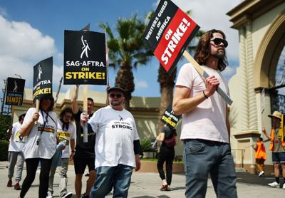 Writers Guild and studio bigwigs make progress to end strike — but don’t expect filming to resume