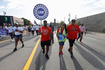 Biden calls on automakers to improve their offer to striking workers as he faces the biggest labor crisis of his presidency so far