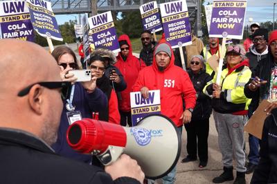 UAW members at Ford and Stellantis approve contract