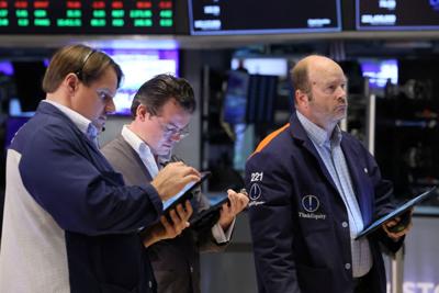 Stocks pare losses after sliding on worries about the economy’s health