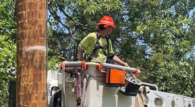 Linemen continue to work trying to restore power to areas impacted by Sunday's storms 1