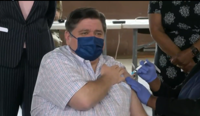 Pritzker receives vaccine