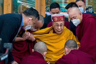 Tibetan leader defends Dalai Lama after 'suck my tongue' request to boy