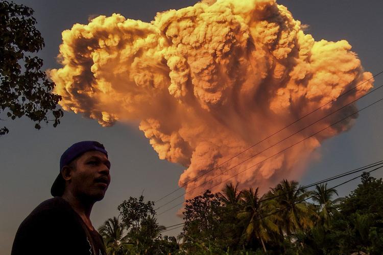 Indonesia volcano spews ash more than 6 miles into sky, dozens of Bali flights canceled
