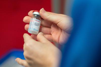 Moderna urges FDA to authorize a half-size booster dose of its Covid-19 vaccine for some adults