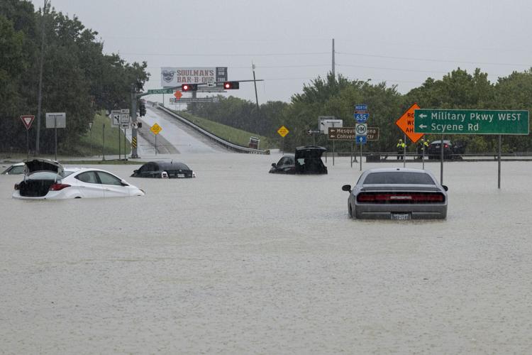 Flash flooding in Dallas area takes residents by surprise as rescue crews respond to hundreds of calls for help