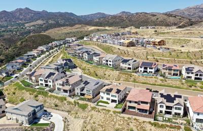 Mortgage rates inch up, lingering above 7%