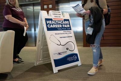 The US economy added 339,000 jobs last month, soaring past expectations — again