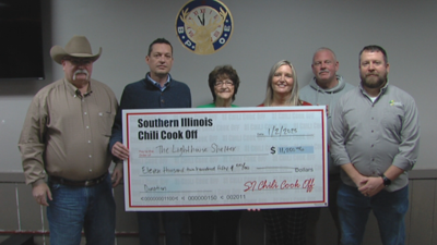 Check presentation to Lighthouse Shelter