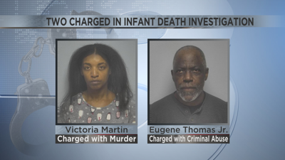 Two charged in infant death investigation