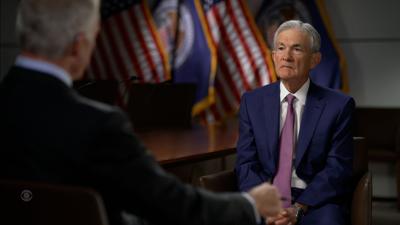 Stocks sink after Fed Chair Powell pleads for patience on rate cuts