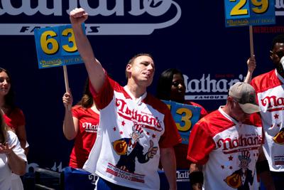 He ate how many? Hot dog champ does it again