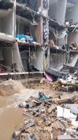 Apartment building partially collapses after severe weather, flooding in WV.