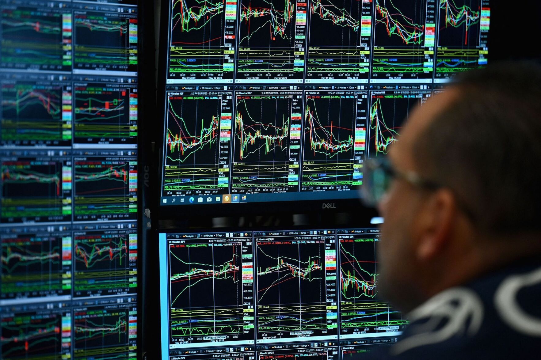 Dow surges over 700 points as investors cheer jobs report and debt ceiling deal
