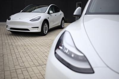 Tesla reverses course, raises prices on two top-end models