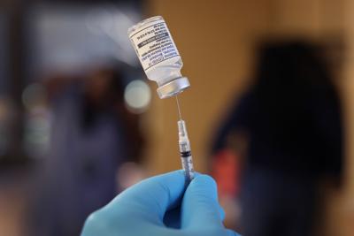 Updated boosters are cutting the risk of getting sick from Covid-19 by about half