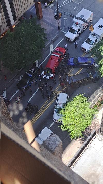 A man shot and wounded 3 people in a downtown Atlanta food court before he was shot by a police officer, officials say