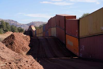 Arizona to remove makeshift border wall as part of a lawsuit, court filing says