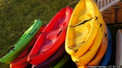 stack of kayaks