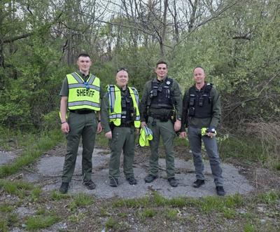 Deputies in the woods photo