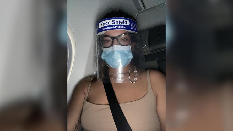 Chicago woman quarantined in airplane bathroom for 3 hours after testing positive for Covid-19 mid-flight