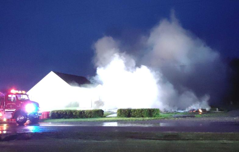 Possible lightning strikes church in Massac County. Heavy fire damage