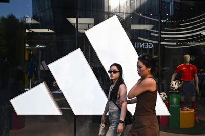 Two Adidas employees out in China corruption probe