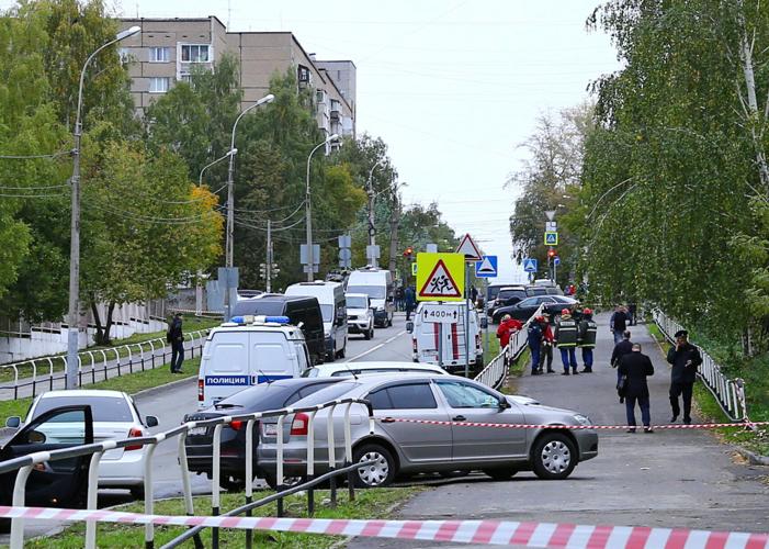 At least 11 children among dead after gunman opens fire at school in Russia