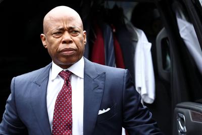 NYC Mayor Eric Adams pleads not guilty to federal corruption charges as New York’s governor considers removing him