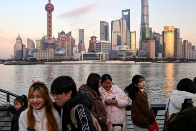 China鈥檚 economy grows more than expected. But fears of Trump tariffs loom