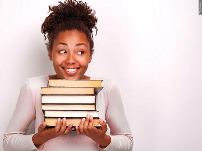Girl holding books