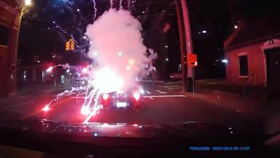 firecracker thrown into convertible
