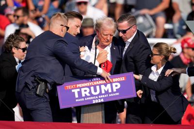 ‘Let me get my shoes’: What was said on stage in the seconds after Trump was shot