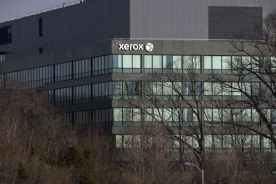 Xerox shares slide after cutting 15% of its workforce
