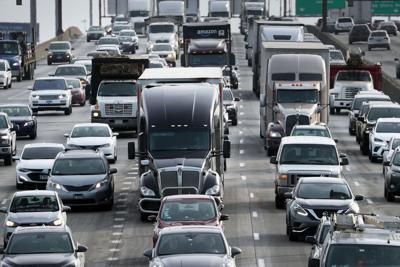 Biden administration rolls out strongest pollution standards for heavy-duty trucks and buses