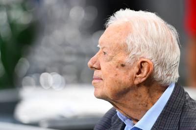 Jimmy Carter's children and grandchildren remain at his side during hospice care, relative says