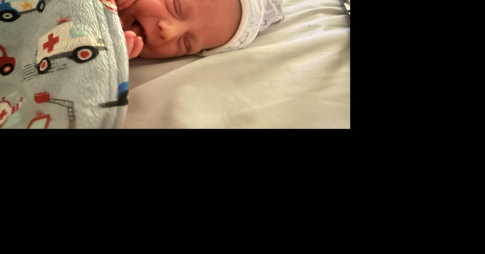 Terre Haute firefighters deliver baby, bring gifts two weeks later