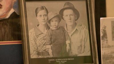 Elvis Presley and his parents Gladys and Vernon