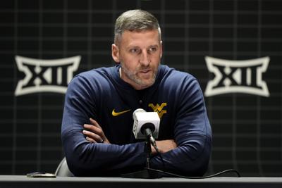WVU men's basketball Mountaineers survive group inexperience Blue