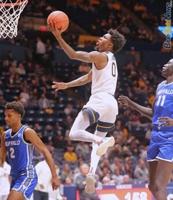 WVU matches Buffalo's physicality in return to floor