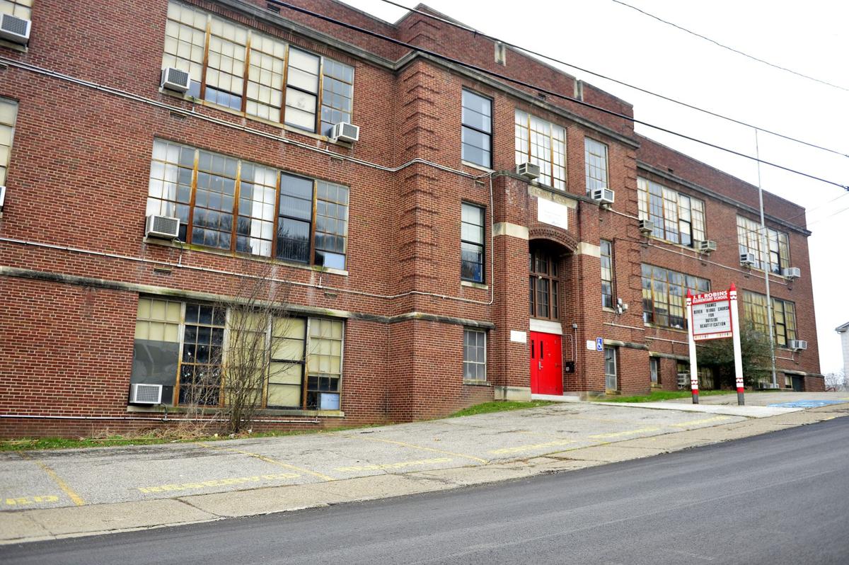 2 closed Charleston schools sold, but for far below listed value