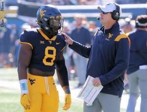 Improved physicality, communication requirements for WVU's defense, Blue  Gold News