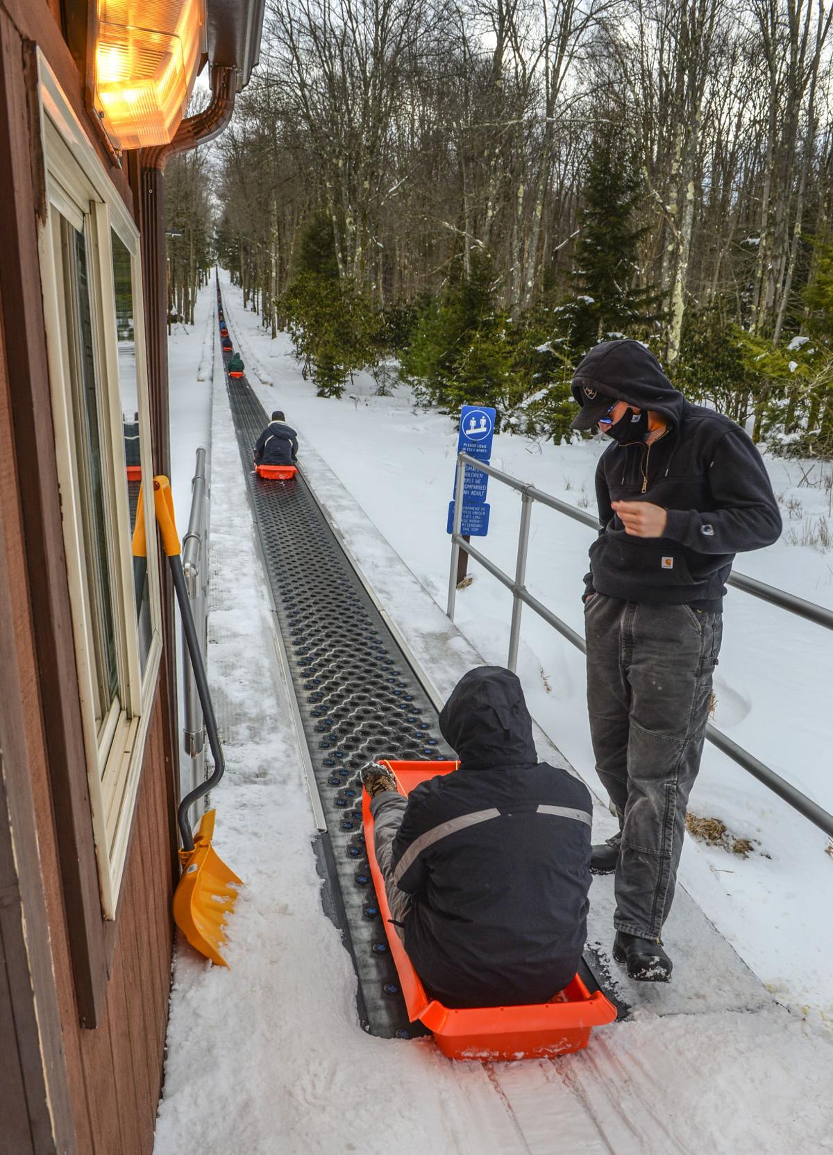 Sledding at Blackwater Falls State Park a winter weather destination