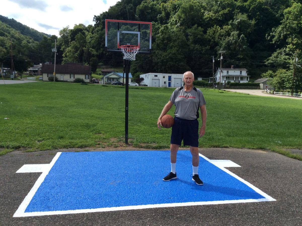 Former East Bank High Hoops Player Creates Basketball Court For