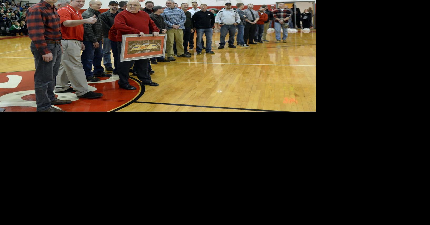 Poca High names basketball court after longtime coach Putnam Review